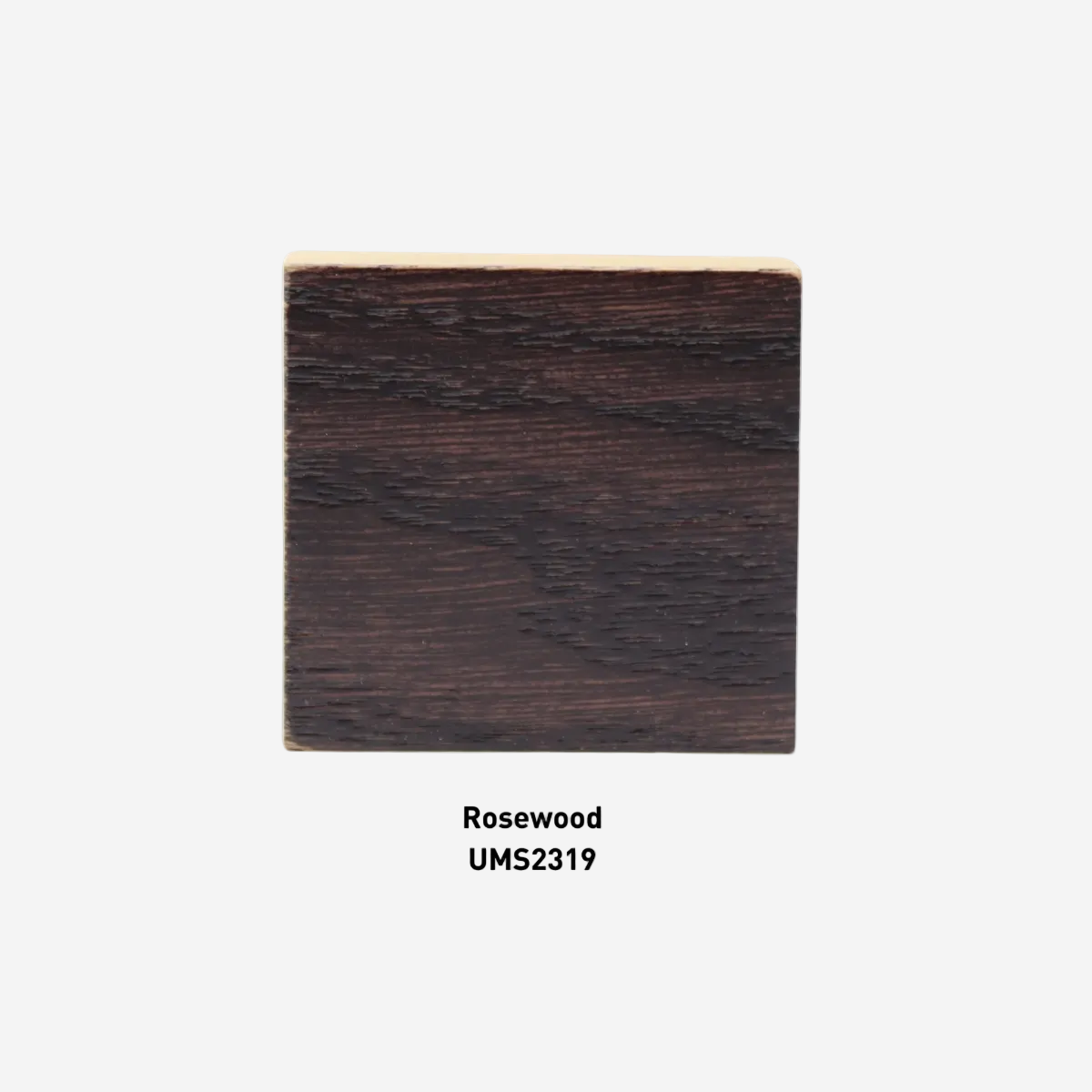 Square piece of rosewood with UMS2319 label on a white background
