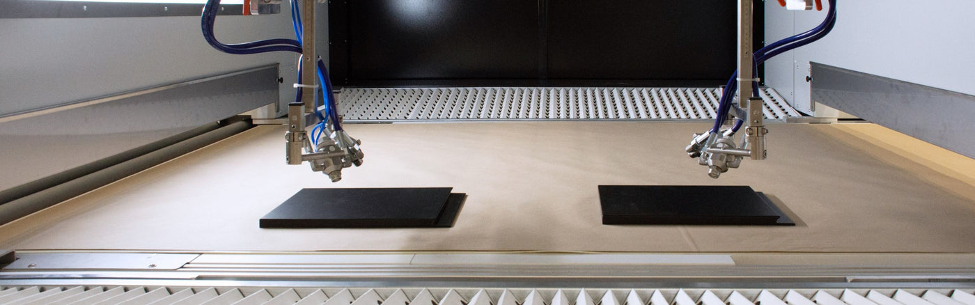 two industrial paint spray guns in auto spray line machine