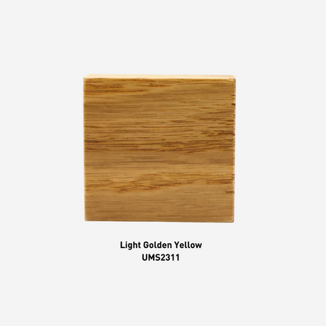 Square wooden sample with 'Light Golden Yellow UMS2311' label on a white background